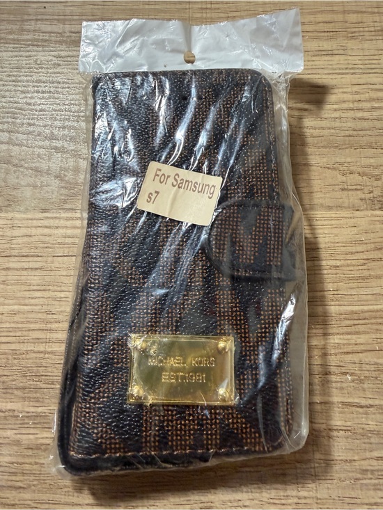 Michael Kors Handbags - Michael Kors Brown Monogram Phone Case with Gold Plaque